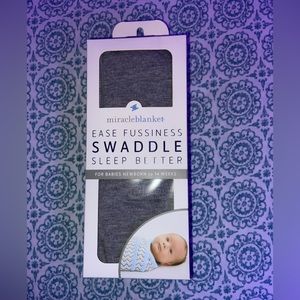 Miracle blanket swaddle